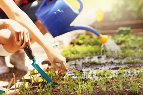 Team of gardeners working in a lush garden