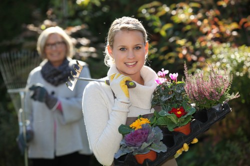 Gardener practicing sustainable gardening methods